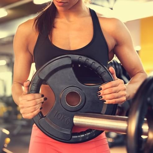 woman carrying weights